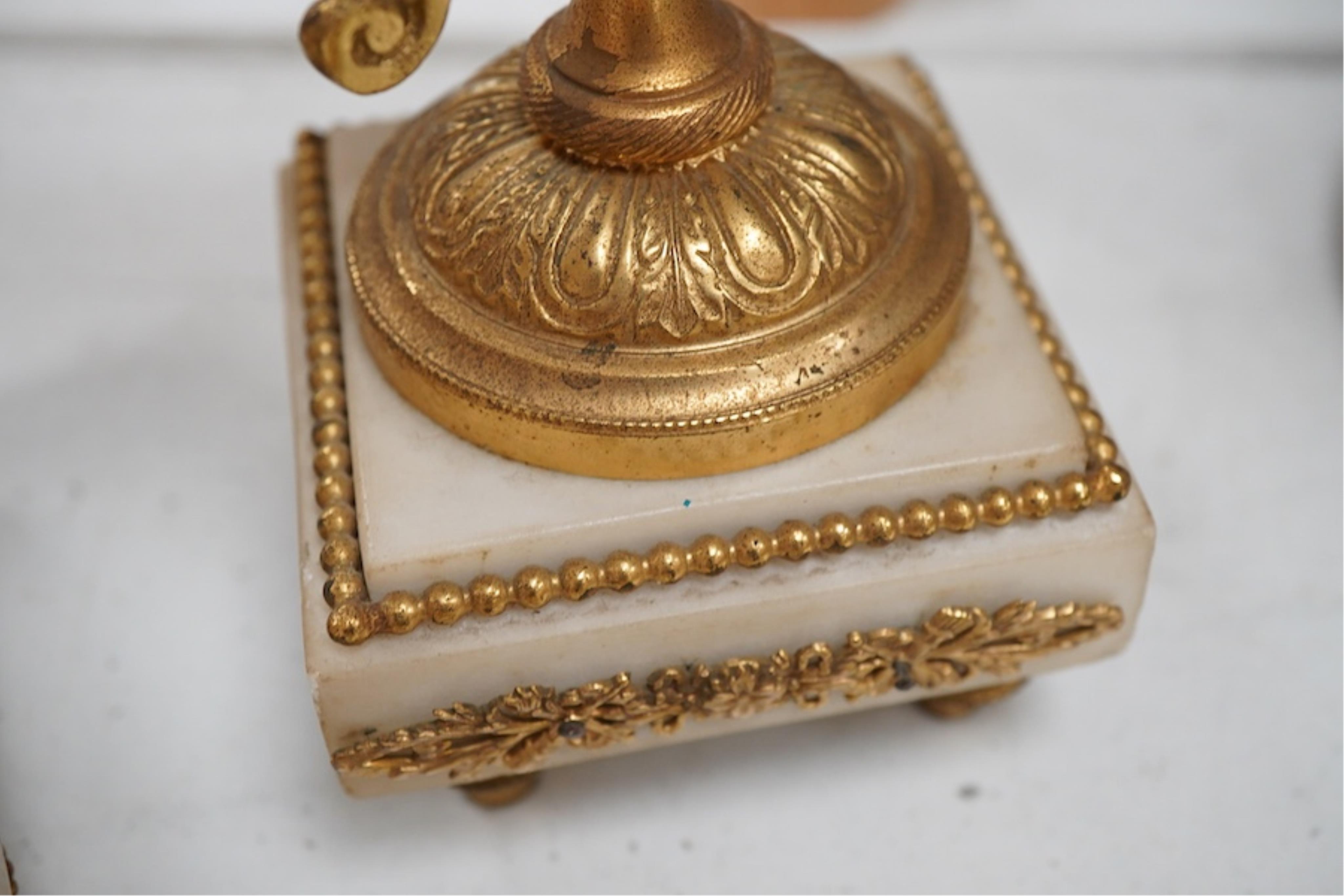 A late 19th century French gilt metal mounted clock garniture, 41cm